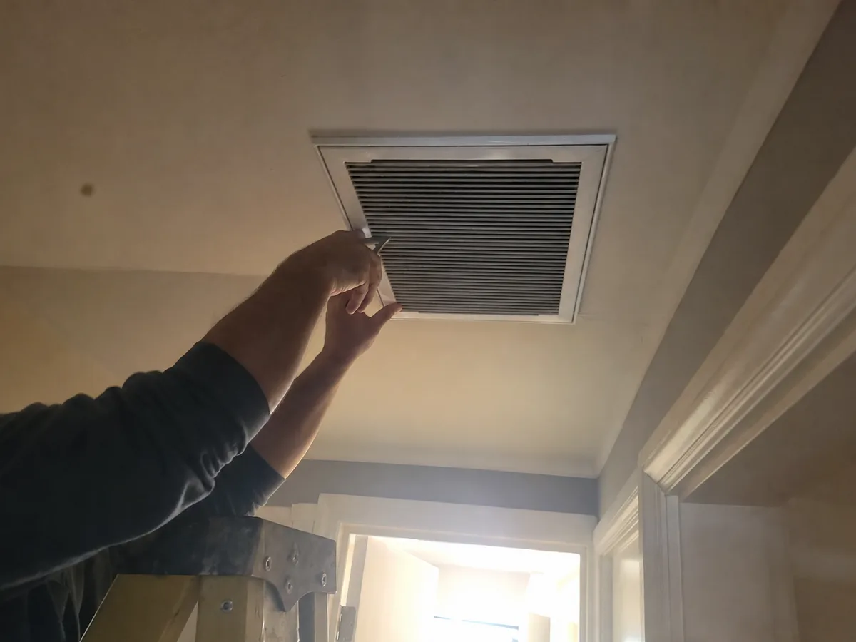 air duct cleaning technician on the job in Cape Coral, FL